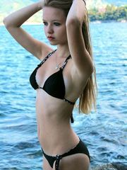 Youngster cool princess in swimsuit,