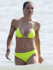Michelle Hunziker in yellow bathing suit